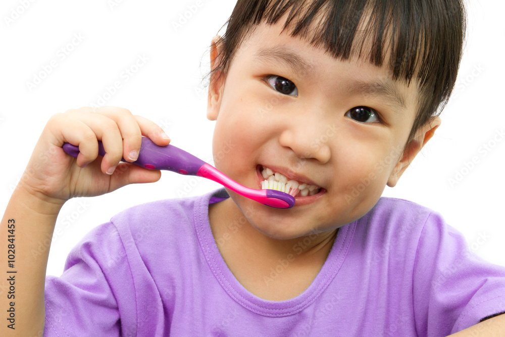 Chinese little girl brushing teeth Chinese little girl brushing teeth