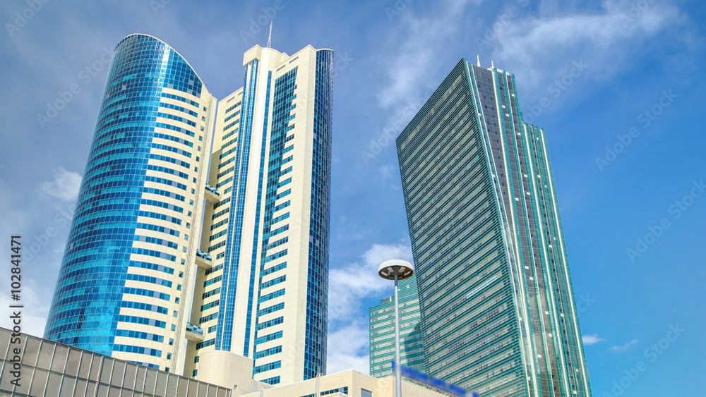 Nurzhol Boulevard timelapse hyperlapse. Modern new office building is in the capital of Republic. Astana, Kazakhstan. Nurzhol Boulevard timelapse hyperlapse. Modern new office building is in the capital of Republic. Astana, Kazakhstan.