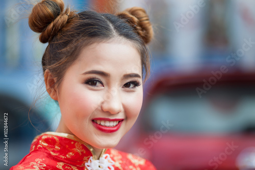 Beautiful Asian model wearing traditional Cheongsam 