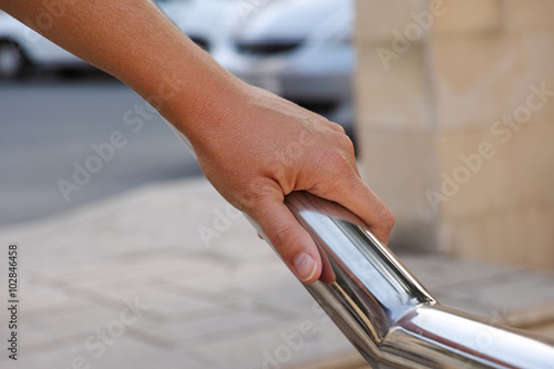 Canvas Print Woman hand on handrail