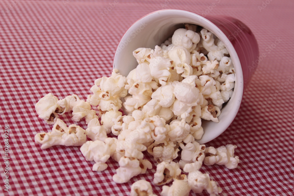 popcorn in a red cup popcorn in a red cup