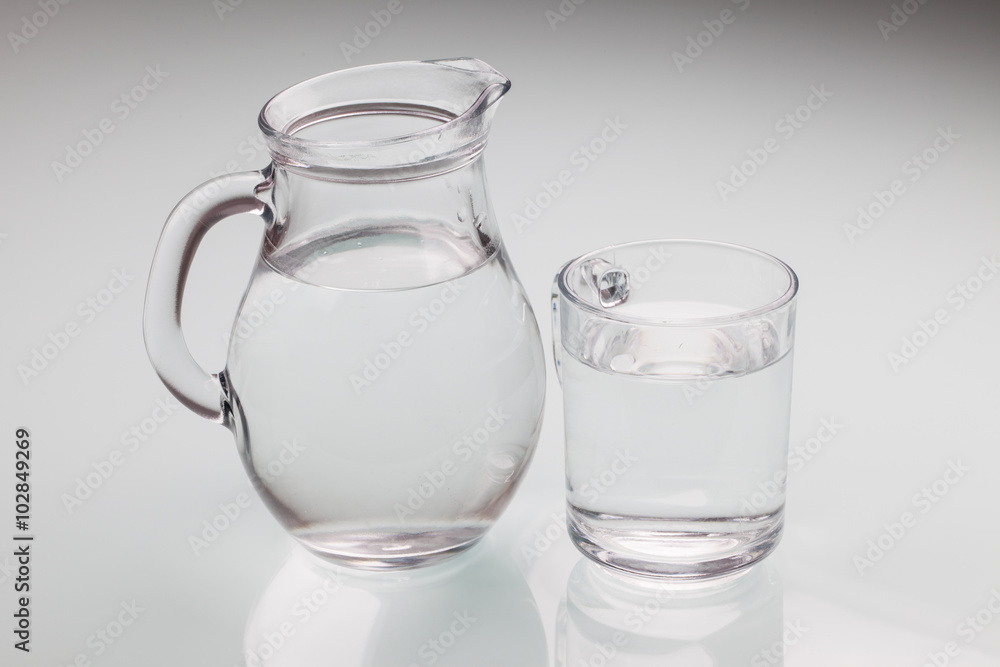 Drinking water isolated on gray background Drinking water isolated on gray background