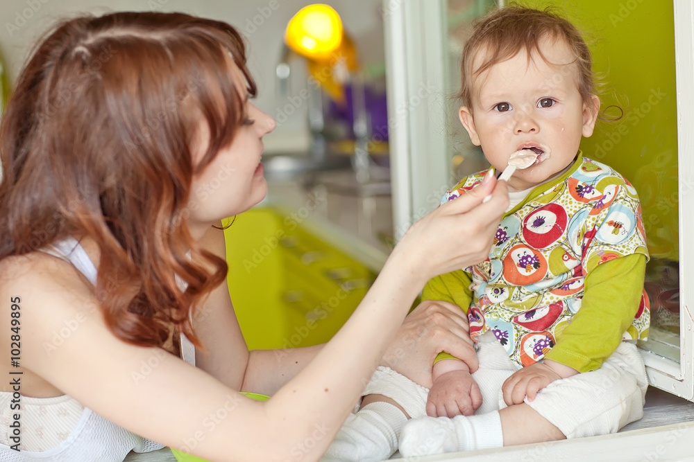 Little baby are eating with mother Little baby are eating with mother