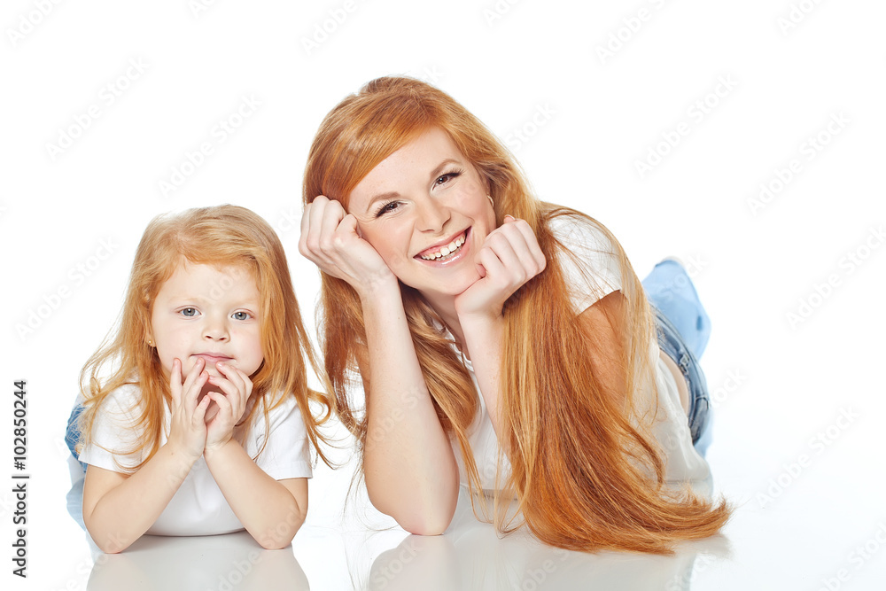 Mother with daughter in studio, white background Mother with daughter in studio, white background