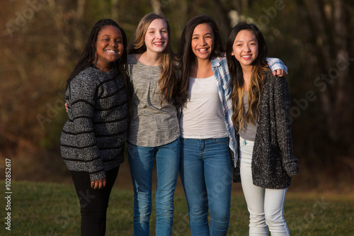 Fotografie Group of girl friends outside