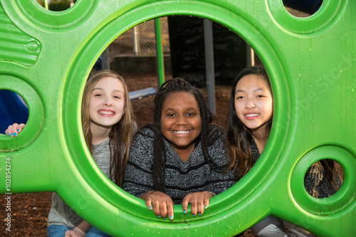 Photography Group of girls playing together at school playground