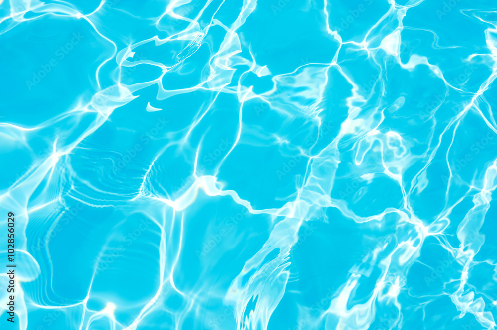 Ripple water surface and sun reflection in swimming pool Ripple water surface and sun reflection in swimming pool