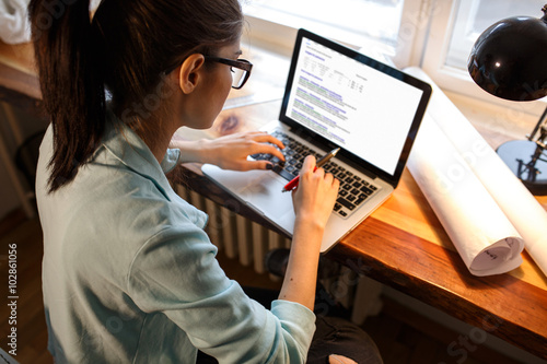 Photography Young female blogger working at home