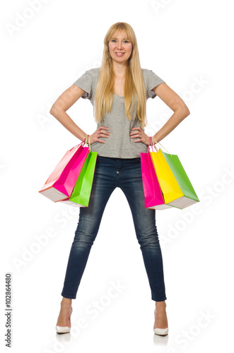 Woman with shopping bags isolated on white © Elnur