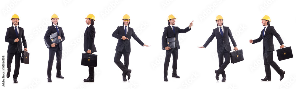 Young architect wearing hardhat on white Young architect wearing hardhat on white