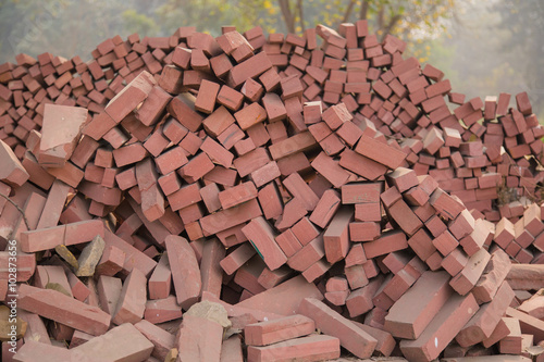 Pile of old handmade bricks
