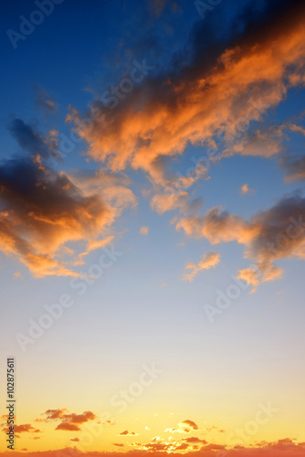 Colorful sky with clouds at sunset. Nature background.