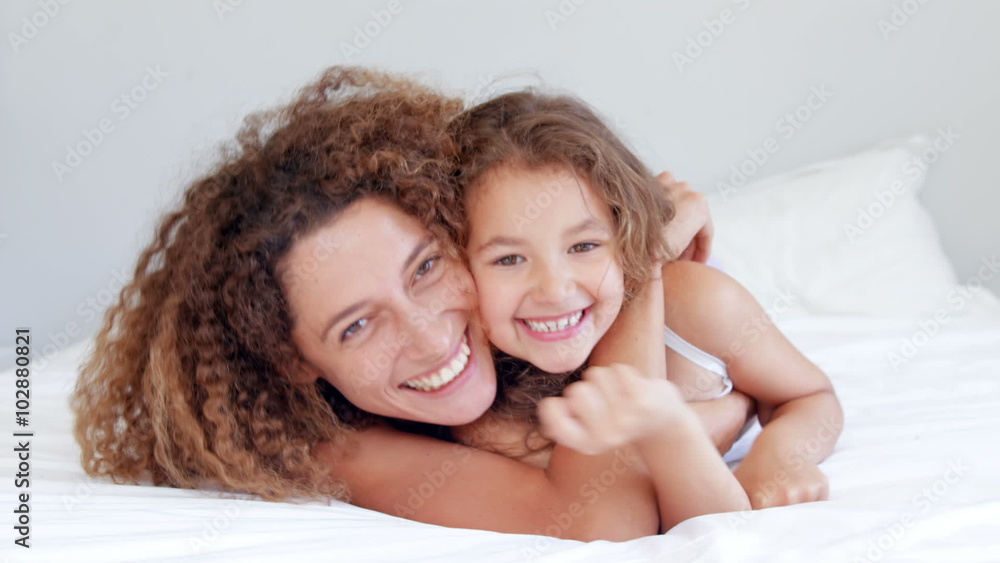 Mother and daughter hugging Mother and daughter hugging