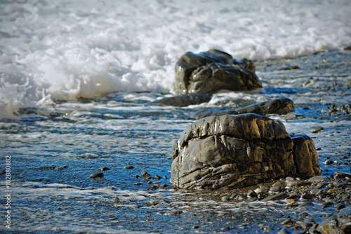 smooth sea stones on the beach