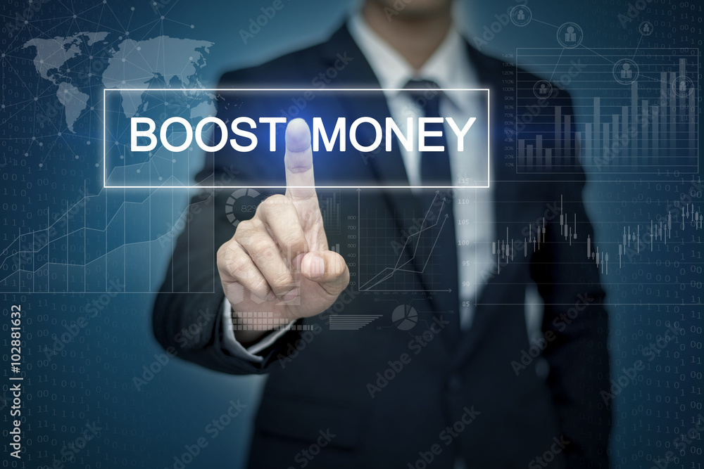 Businessman hand touching BOOST MONEY button on virtual screen Businessman hand touching BOOST MONEY button on virtual screen