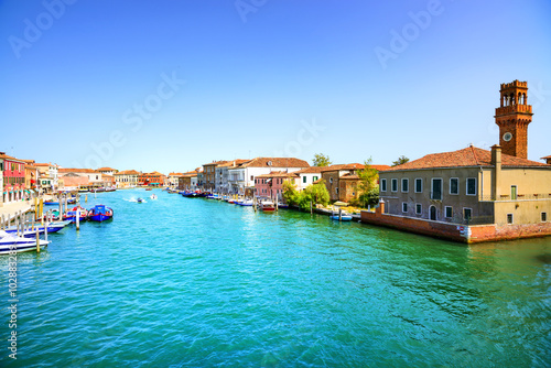 Murano glass making island, water canal and buildings. Venice, I