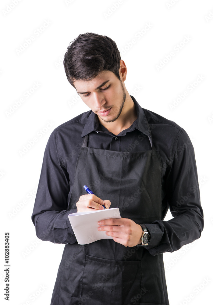 Young chef or waiter wearing black apron isolated Young chef or waiter wearing black apron isolated