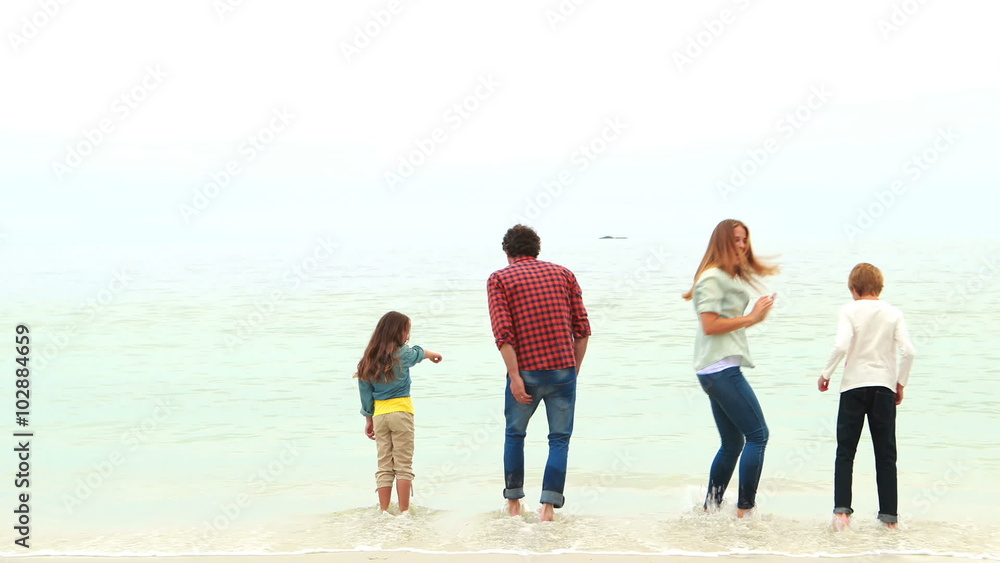 Family looking at the beach Family looking at the beach