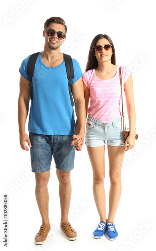 A pair of happy tourists si...