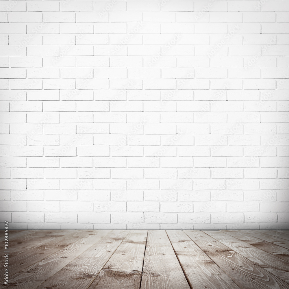 Room interior with brick wall and wooden floor Room interior with brick wall and wooden floor