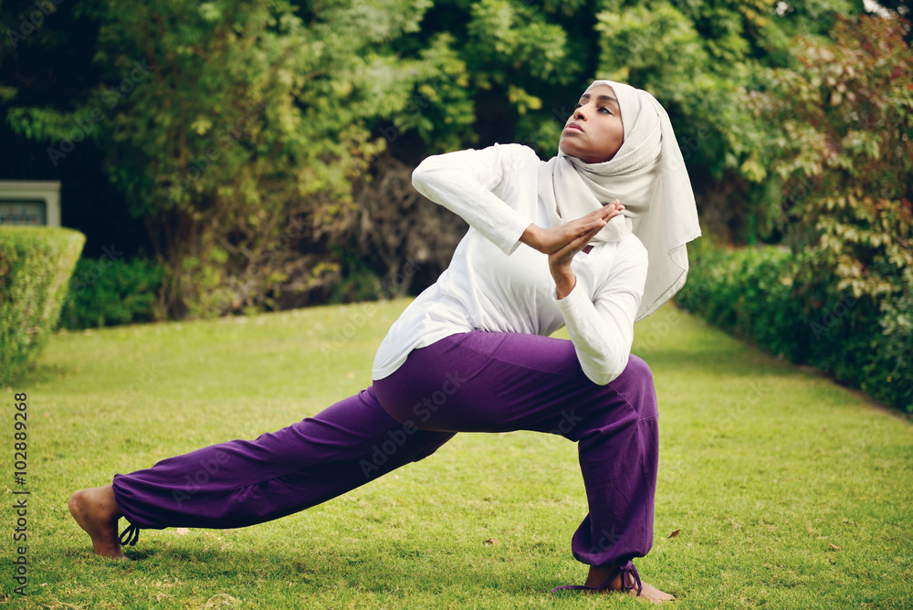 Woman doing yoga in outdoor, Dubai