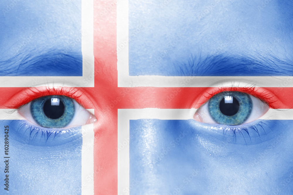 child's face with icelandic flag