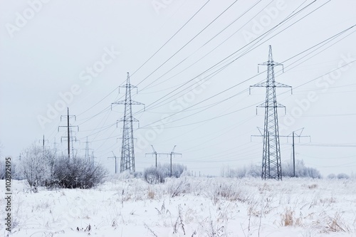Electricity towers in winter © azamotkin