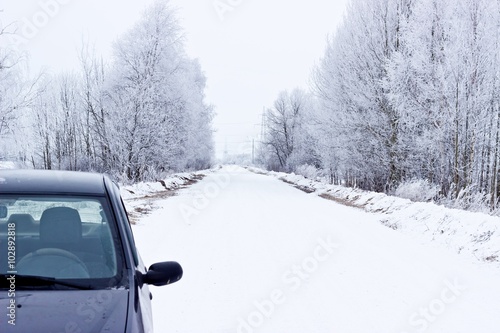 Car on winter road © azamotkin