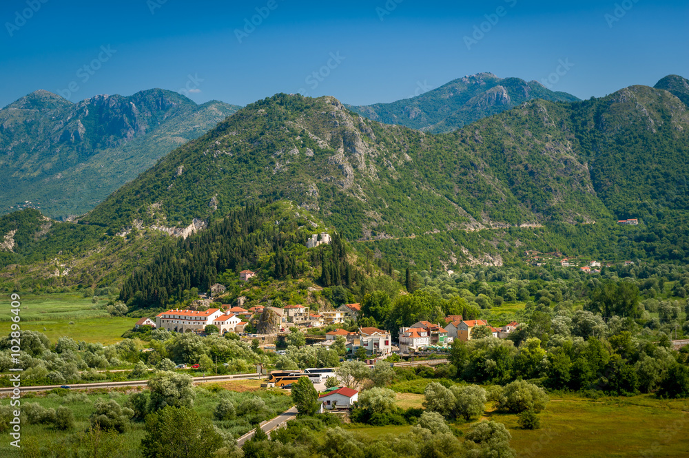 Aerial Montenegro landscape with Virpazar town and mountains of Skadar lake national park.