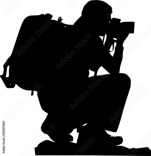 sitting man with a camera 