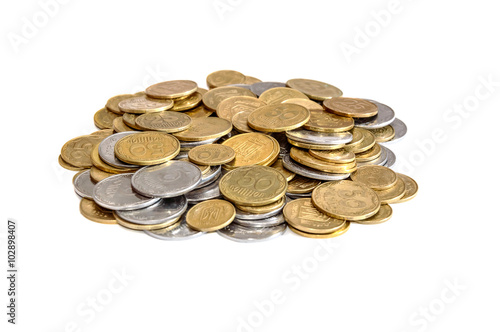 Heap of coins isolated on white
