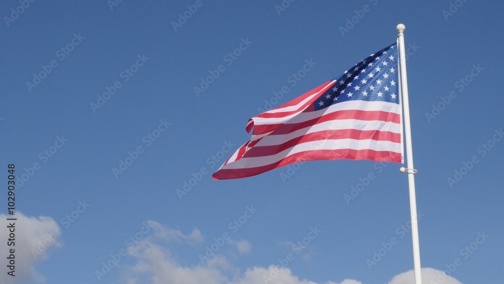 United States of America flag in front of blue sky floating on wind 4K 2160p UltraHD footage - American flag on sunny day in front of sky waving 4K 3840X2160 30fps UHD video United States of America flag in front of blue sky floating on wind 4K 2160p UltraHD footage - American flag on sunny day in front of sky waving 4K 3840X2160 30fps UHD video