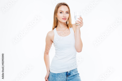 Charming woman holding glass with water