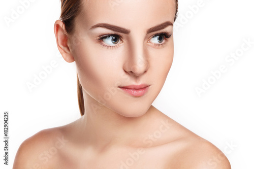 The beautiful face of young woman with cleanf fresh skin 