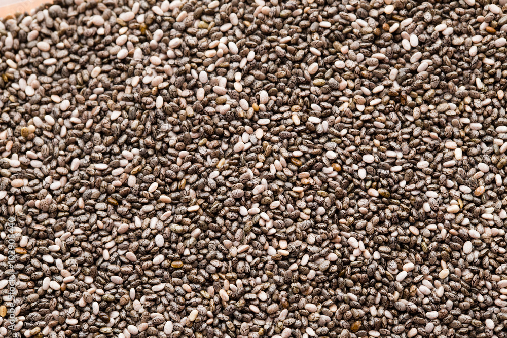 Chia seeds on the background. Chia seeds on the background.