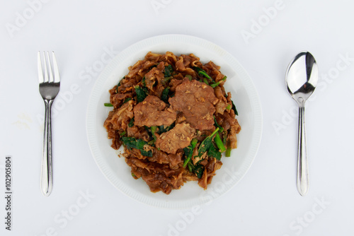 Stir fried flat noodle and pork with dark soy sauce (Thai people called Pad See Ew)
