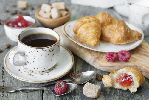 Morning coffee with a crois...