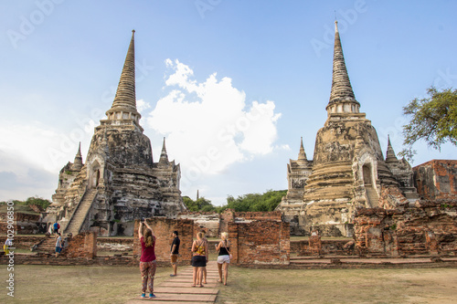 Tourist travel to visit  Wat Phrasisanpetch in the Ayutthaya Historical Park, Ayutthaya, Thailand. © kannapon