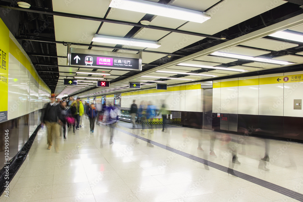 Crowd of passengers walk in Tsim Sha Tsui station on 7 Dec 2015. MTR is the main subway and train system in Hong Kong, and one of large transport networks in Asia