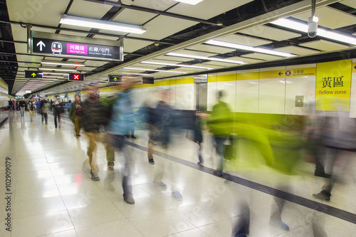 Crowd of passengers walk in Tsim Sha Tsui station on 7 Dec 2015. MTR is the main subway and train system in Hong Kong, and one of large transport networks in Asia