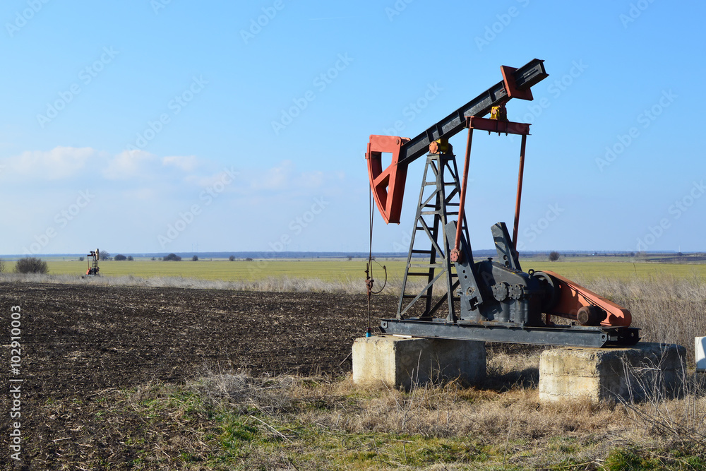 Small Pump Jack in field