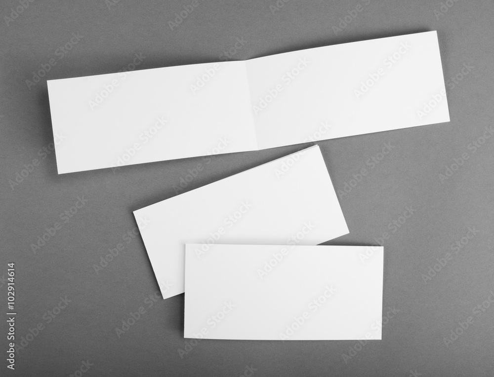 © fontgraf - White empty card on grey to replace your design. © fontgraf - White empty card on grey to replace your design.