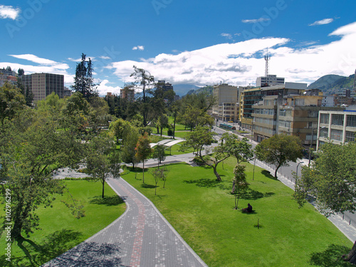 buildings, people, cars on the streets of the capital city of Qu