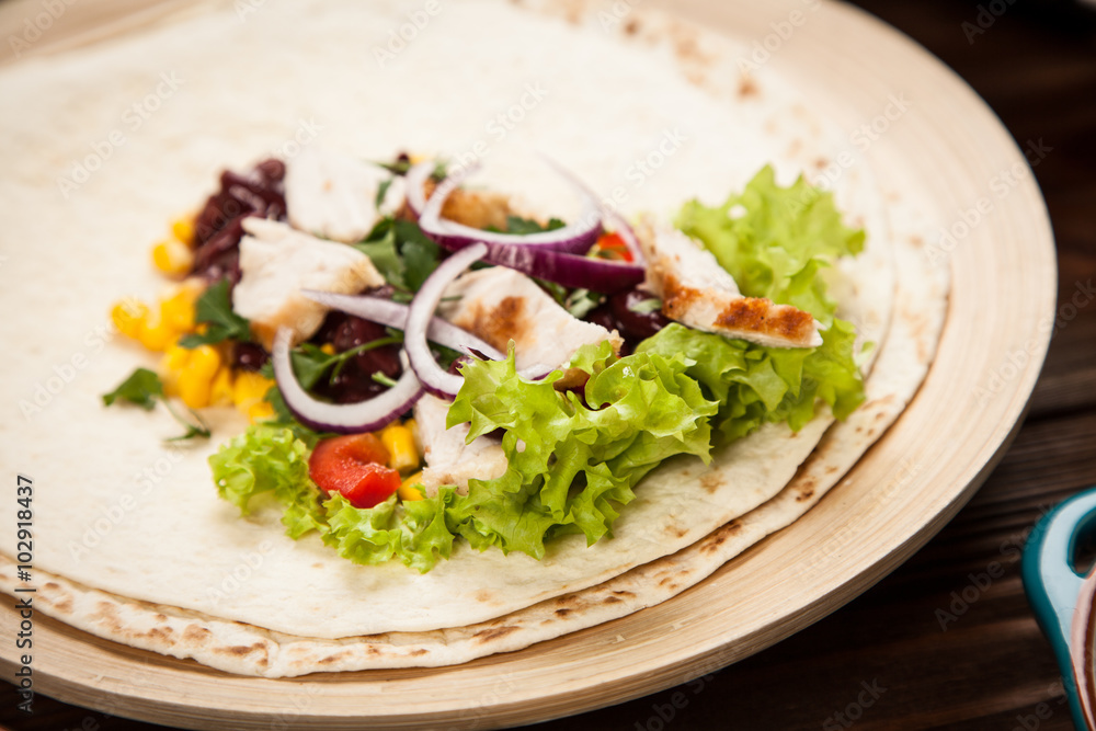 Tortilla with a mix of ingredients Tortilla with a mix of ingredients