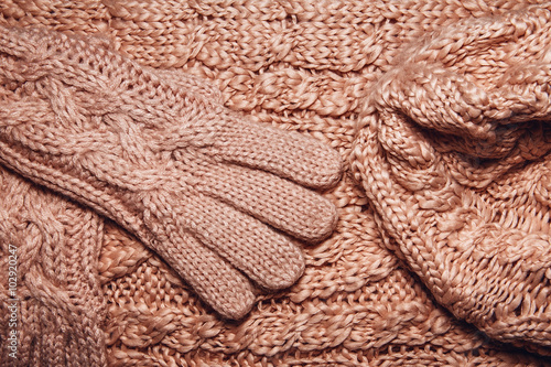 Set of Wool sweater or scarf, hat and gloves texture close up