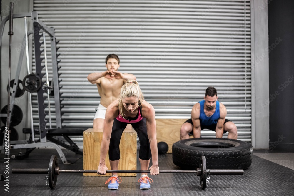 Fototapeta premium Fit people doing exercises