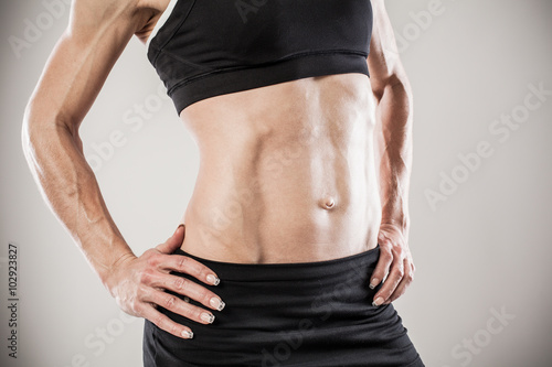 Muscular female body photo