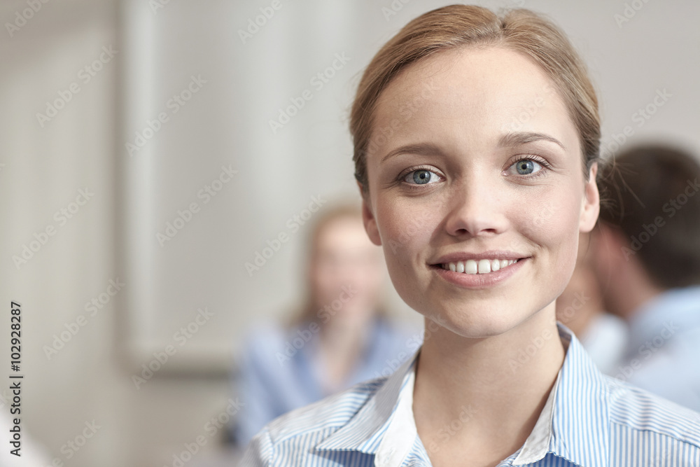 group of smiling businesspeople meeting in office group of smiling businesspeople meeting in office