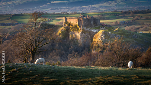 Carreg Cennen castle sits high on a hill near the River Cennen, in the village of Trapp, four miles South of Llandeilo in Carmarthenshire, South Wales
 photo