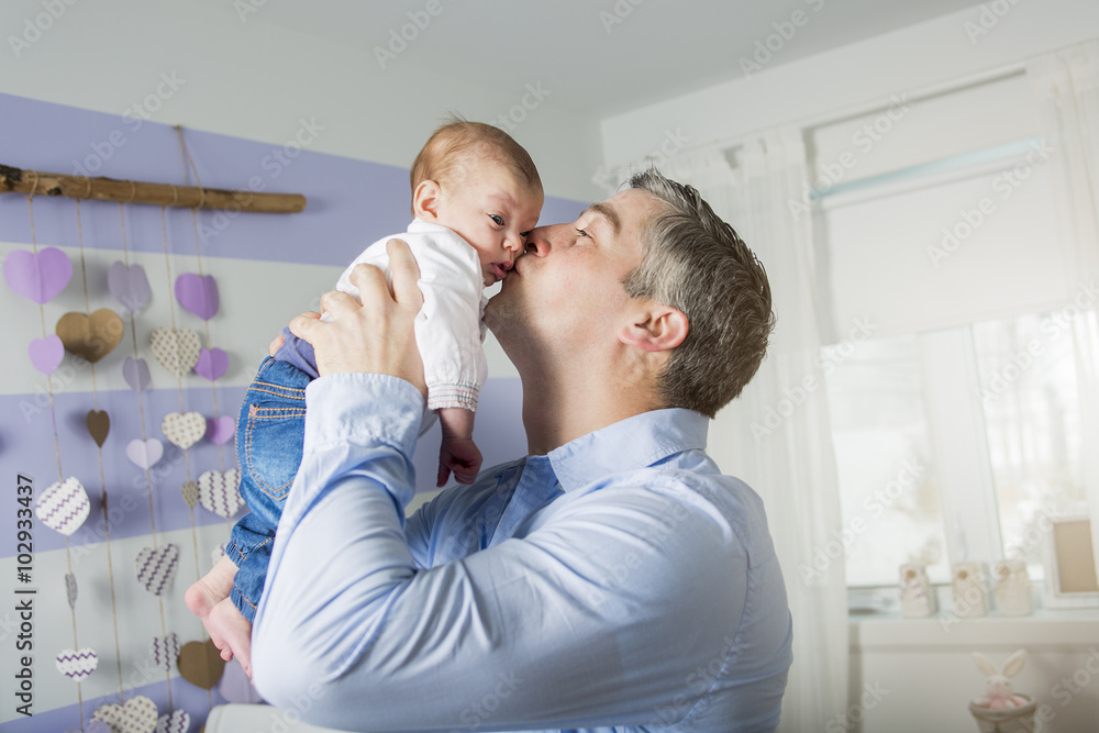 Father and baby at home together, bedtime Father and baby at home together, bedtime